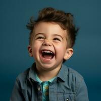 a young boy is laughing in front of a blue background generative ai photo