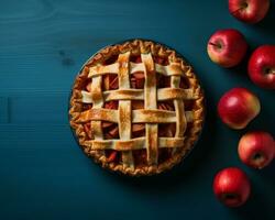 un manzana tarta con enrejado en un azul mesa generativo ai foto