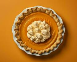 pumpkin pie with whipped cream on top on an orange background generative ai photo