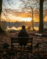 a person sitting on a bench generative ai photo