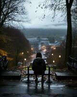 un persona sentado en un parque banco en el lluvia generativo ai foto