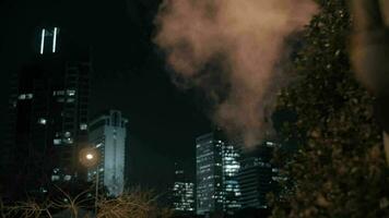 Night cityscape with condensing steam, Tel Aviv video