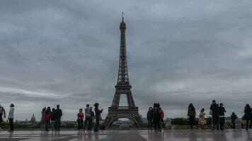 People observing Eiffel Tower from viewing point in Paris, France video