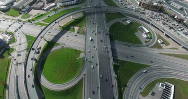 Transport traffic on infinity interchange, aerial view video