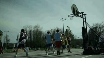 Teenagers playing basketball 1 video