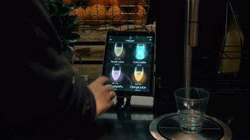 Drink order using digital menu on touch pad in cafe video