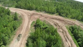 Armoured vehicle on country road, aerial view video