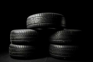 Car tires on dark background. Generative AI photo