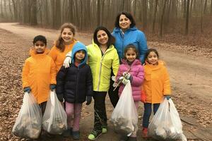 Group kids dropping the bottle Separating waste plastic bottles into recycling bins is to protect the environment  ,Generative AI photo