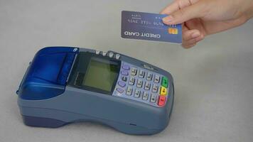 Close up hand swipe credit card pay shopping. photo