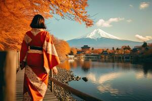 Woman backgrounds mountain Fuji with morning fog and red leaves at lake Kawaguchiko is one of the best places in Japan ,Generative AI photo