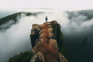 Man standing on top of cliff at top view ,Generative AI photo