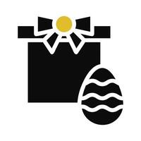 Gift egg icon solid grey orange colour easter symbol illustration. vector