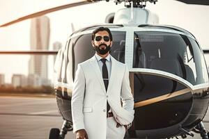 Successful Muslim handsome businessman in traditional white kandoor with private helicopter in the background. Successful Saudi, Emirati, Arab businessman. Generative AI . photo