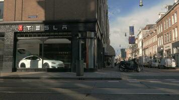 Tesla Store on street corner in Amsterdam video