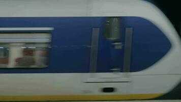 Trains at the railway station of Amsterdam Airport video