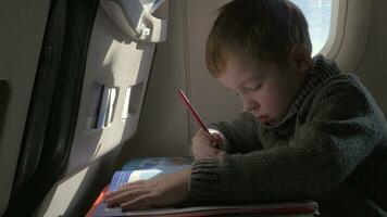 Close up view of small boy learning to writing with pencil video
