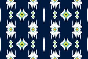 Seamless pattern of Ikat Paisley, traditional seamless pattern, dark blue background, Aztec style, embroidery, abstract, vector, design illustration for texture, fabric, print. vector