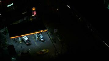 Timelapse of cars fueling at Shell station in Bangkok video