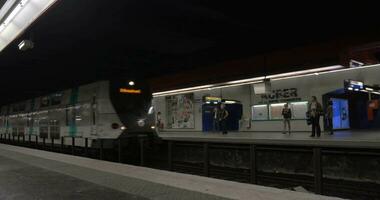 Double-decker train arriving to subway station video