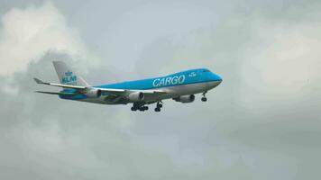 AMSTERDAM, THE NETHERLANDS JULY 27, 2017 - Cargo Boeing 747 of KLM approaching before landing at Schiphol Airport. Wide body double deck cargo aircraft video