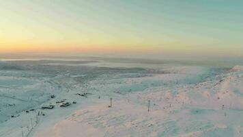Aerial Shot of Sunrise in Winter Mountains video