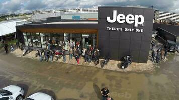 Flying over the people at Jeep dealership video