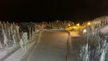 Aerial view of ski centre at night, Finland video