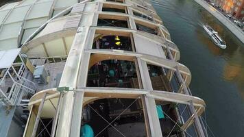 Riverside bar with open veranda, aerial view video