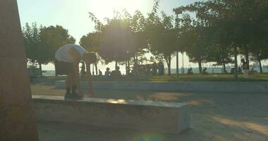 Teenager performing push-ups on waterfront video