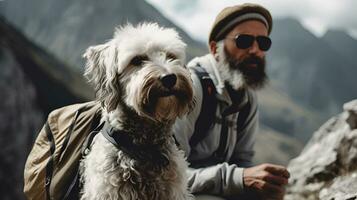 Man hiking in fluffy bearded gray dog in mountains in autumn pet adoption traveling with dog generative ai photo