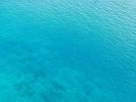 Top view of blue frothy sea surface, Shot in the open sea from above photo