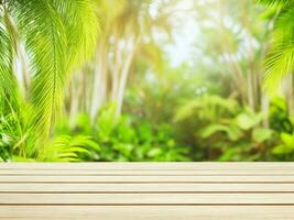 Empty wooden table with blurred tropical jungle background photo