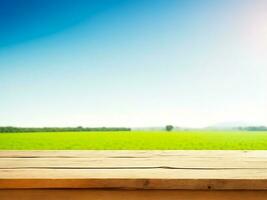 Empty wooden table with green farm background, blank place for product photo