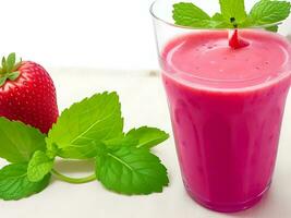 A portion of fresh fruit smoothie with mint photo