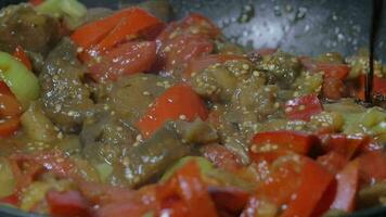 Pouring soy sauce into pan with vegetarian dish video