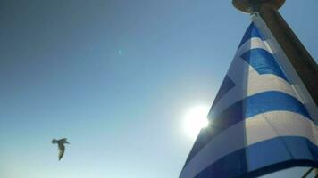 Greek flag waving in the wind on sky background video