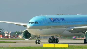 Passenger airplane passing by fire-engine on runway video