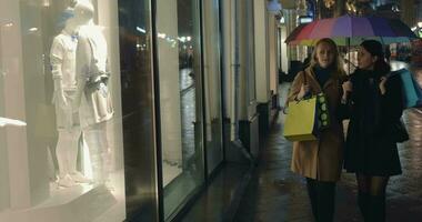 Evening shopping in rainy city video