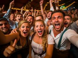 Group of happy young people having fun and dancing at oktoberfest photo