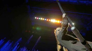 Girl swinging on the trapeze during performance video