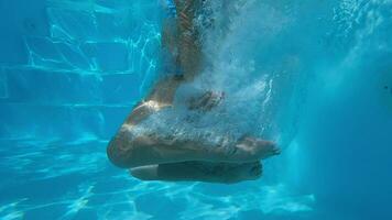 Girl swimming to mom underwater video
