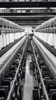 Modern textile factory with automated looms weaving patterns photo