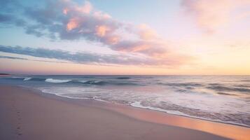Tranquil beach scene at twilight with soft sunset colors blending into sky for ample copy space photo
