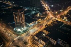 A street at night with vehicles and highways photo