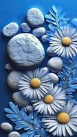 A blue flower and stone background photo