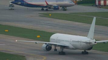 SOCHI, RUSSIA JULY 31, 2022 - Boeing 777 of Nordwind Airlines taxiing on the runway at Sochi airport. Tourism and travel concept video