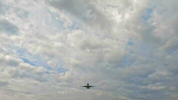 Passenger airplane is landing, flying overhead video