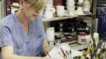 Working in a Ceramic Handmade Art Workshop and Tools video