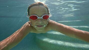 Boy swims underwater video